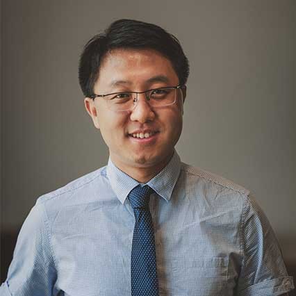 head shot of Dr. Jue Wang