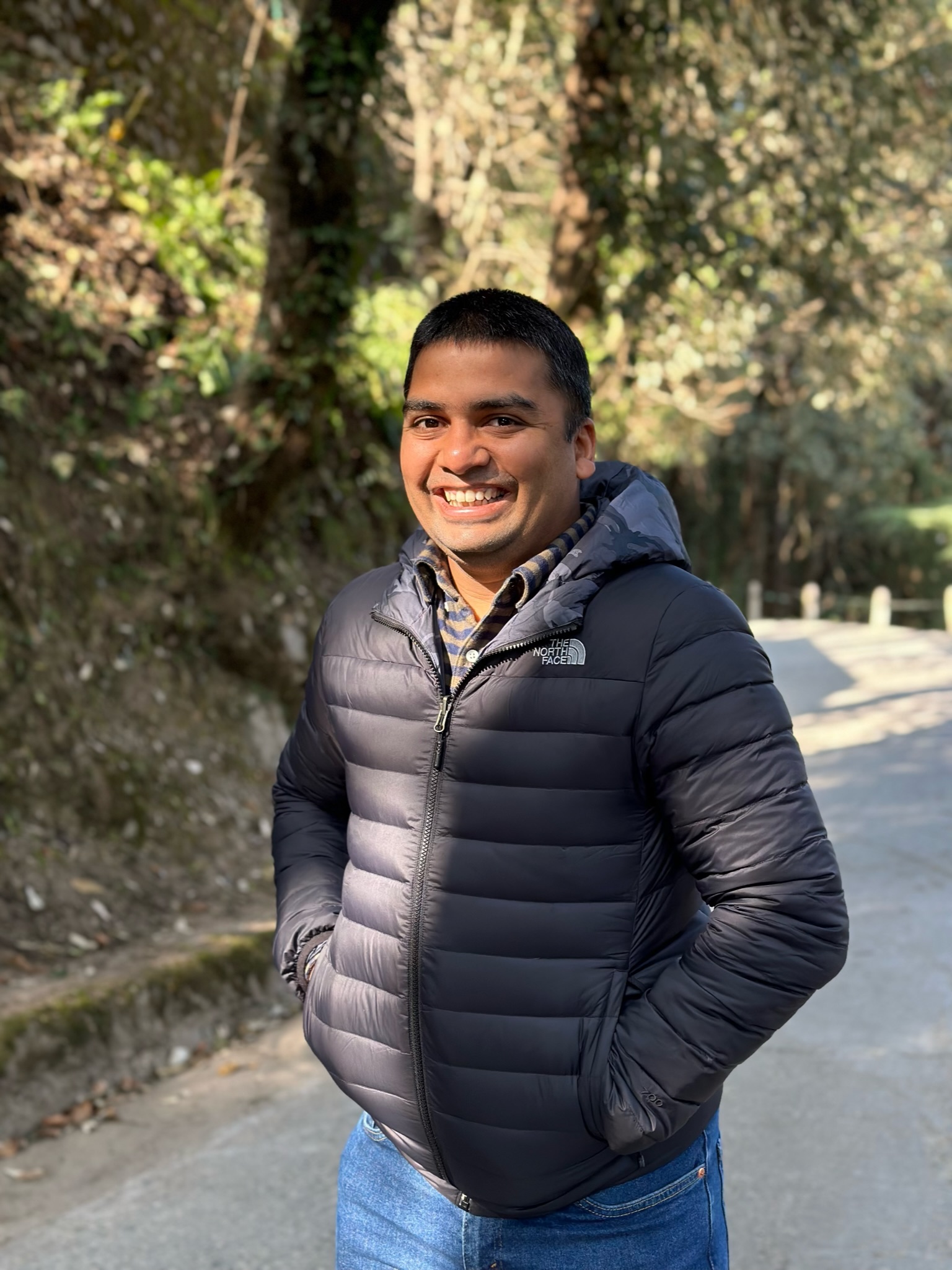Dr. Gaurav Mittal walks along a road